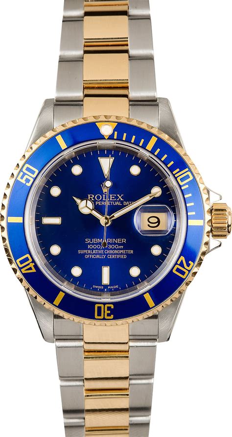 blue and gold.rolex|gold Rolex with blue face.